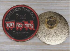 Toys for Tots commemorative pin and back.