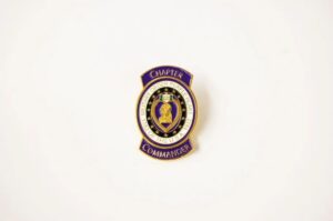Chapter Commander badge on white background.