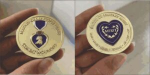 Military medal with heart-shaped emblem.