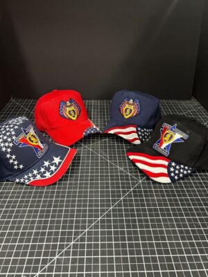 Patriotic caps with embroidered logos displayed.