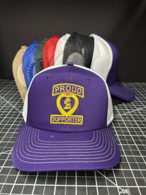 Purple "Proud Supporter" cap with others behind.