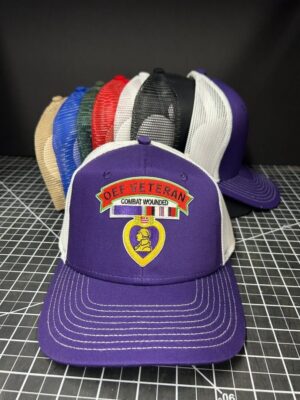 Purple veteran cap with combat wounded emblem.