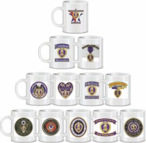 Commemorative mugs with military-themed designs displayed.