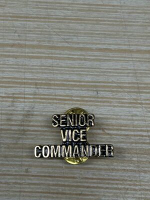 Senior Vice Commander pin on table.