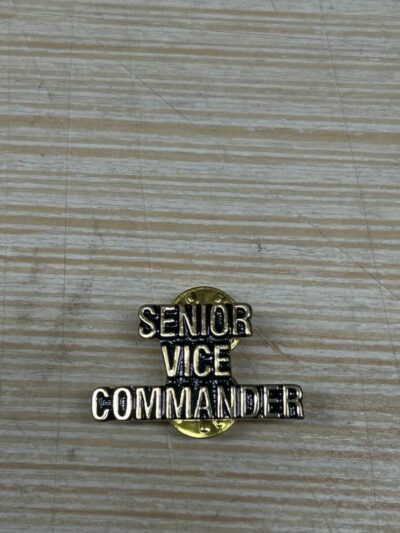 Senior Vice Commander pin on table.