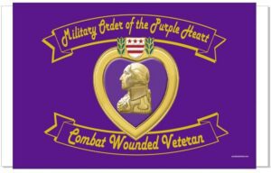 Purple Heart military award insignia on flag.
