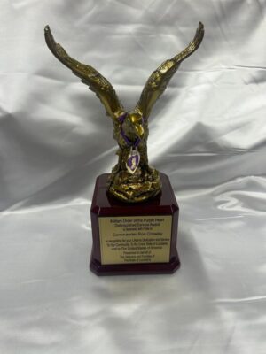 Golden eagle trophy with engraved plaque.