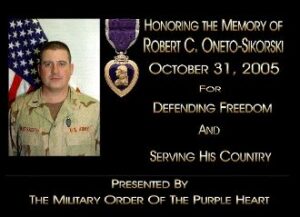 Military tribute honoring fallen soldier.