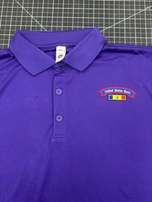Purple polo shirt with military emblem.