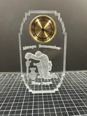 Acrylic clock with firefighter engraving and text.