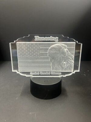 Plaque with eagle and American flag engraving.