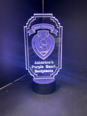 Illuminated plaque honoring Purple Heart recipients.